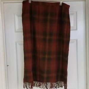 Requirements plaid skirt. Fringed bottom.
